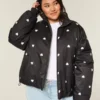 Pufferjacke mit Reißverschlussmuster