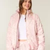 Pufferjacke mit Reißverschlussmuster