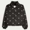 Pufferjacke mit Reißverschlussmuster