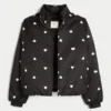 Pufferjacke mit Reißverschlussmuster