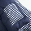Pufferjacke mit Reißverschlussmuster