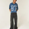 Schweres, baggy geschnittenes, kurzes Football-T-Shirt mit Grafikprint