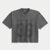 Schweres, baggy geschnittenes, kurzes Football-T-Shirt mit Grafikprint