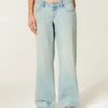 Ultra-niedrige Leibhöhe, hell gewaschen, Baggy-Jeans mit Schnallenverschluss hinten