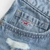 Ultra-niedrige Mini-Shorts aus besticktem Denim