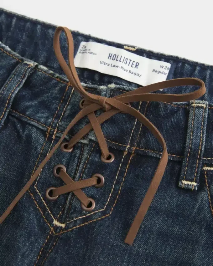 Ultra-niedrige Passform, dunkel gewaschene Baggy-Jeans mit Schnürung