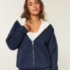 Wendbarer Hoodie mit Kunstfellfutter und Reißverschluss